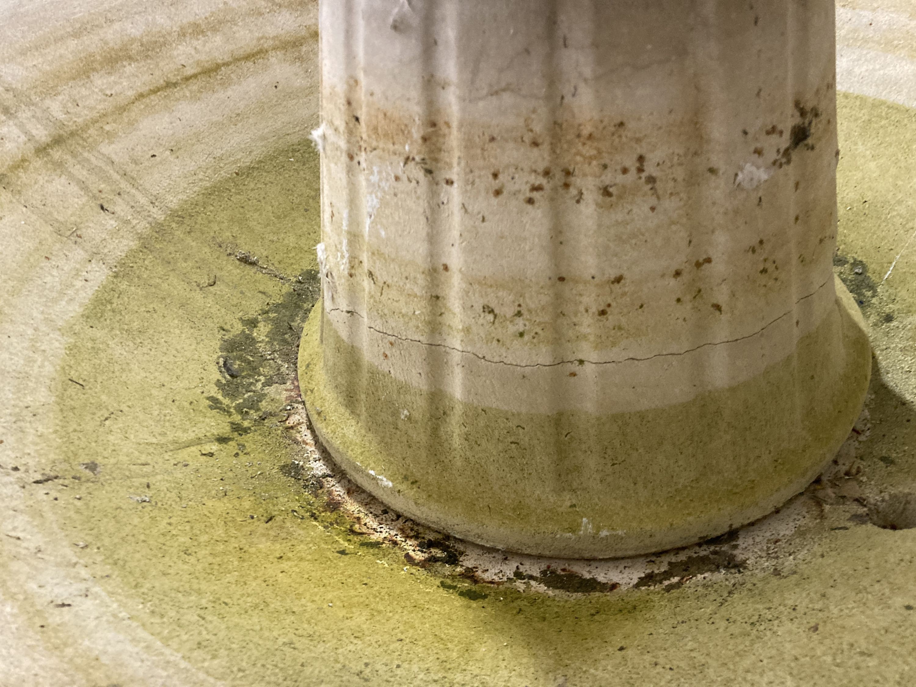 A reconstituted stone circular two tier garden fountain, (faults), diameter 110cm H.140cm